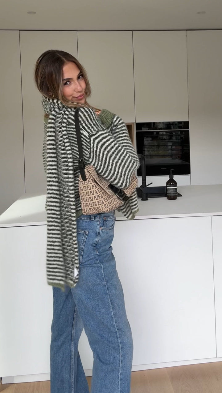 Soft striped cardigan in a muted color
